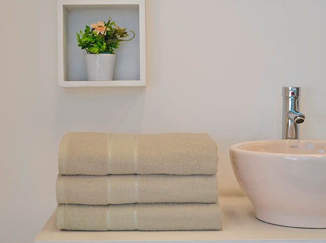 Toalla Nouva Medio Baño Crema Toallas